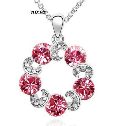 EXQUISITE SWAROVSKI SAPPHIRE CIRCLE PENDANT on chain