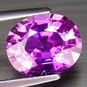 3.9 ct oval facet purple sapphire gemstone