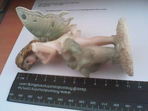 Adorable Little Fairy Figurine with moving Wings