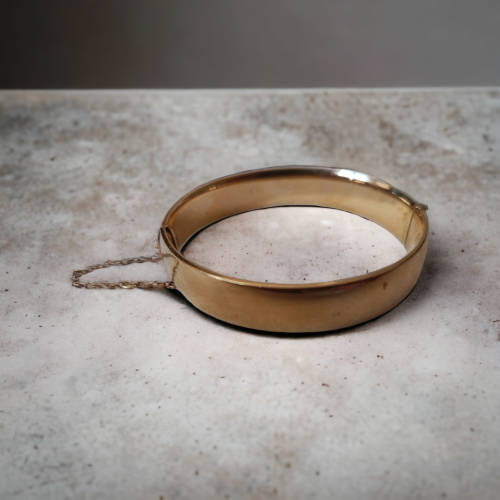 Stunning 9ct gold 1/5 metal core bangle value R6000.00