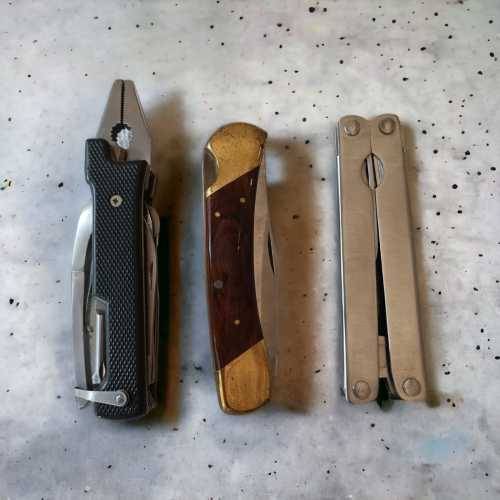 Stunning vintage collectors pocket knives two of which are multi tools with pouches