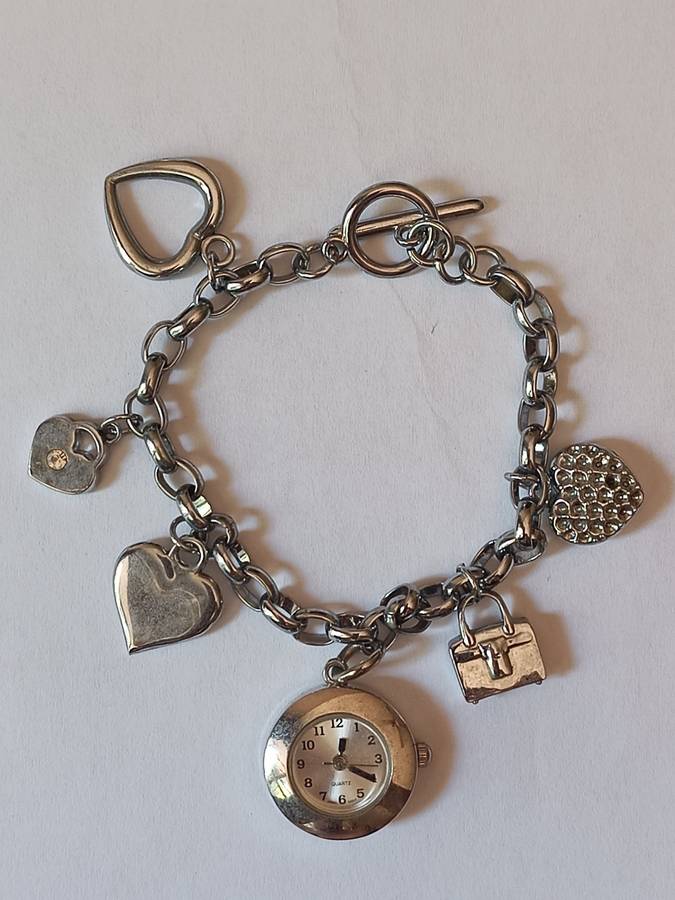 Collectors Cubic Zirconia earings from the Platinum plated collection and a charm bracelet