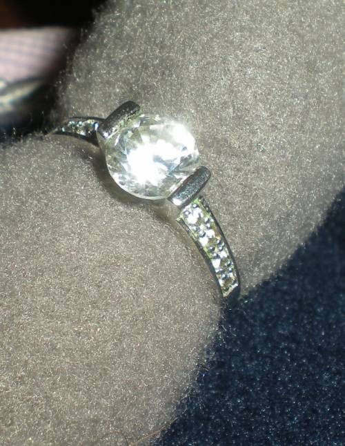 Sterling Silver Ring with 9 white CZ