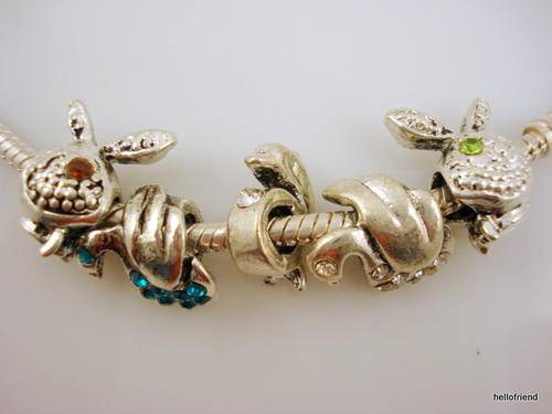 Set of 5 Beads with lovely Crystals Dolphin, Swan and playboy Bunny