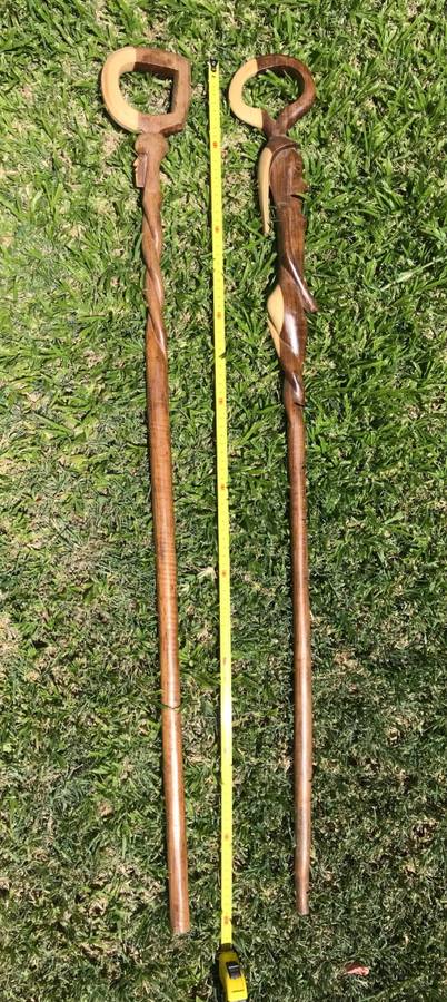 LOT OF 2 HAND MADE WOODEN AFRICAN CRAFT WALKING STICKS , 1M LONG , 1 HEAD , 1 WOMAN, COLLECTORS ITEM