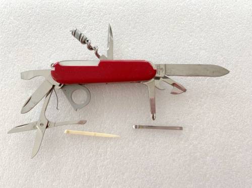 Victorinox Officier Suisse (red) vintage, pocket knife,Switzerland, stainless, rostfrei,