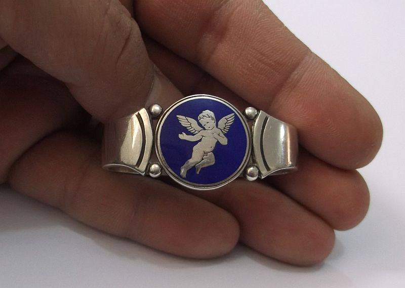 WOW !!! AN AWESOME RARE SOLID STERLING SILVER GEORG JENSEN NAPKIN RING WITH ENAMELED CHERUB MOTIF