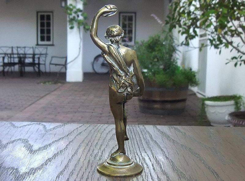 AN AWESOME OLD SOLID BRASS STATUE OF A ROMANESQUE FIGURE ...PERHAPS DANCING ...DETAILED PIECE !!