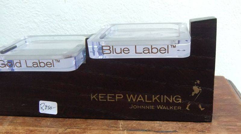 A RARE VINTAGE JOHNNIE WALKER WHISKEY BOTTLE DISPLAY STAND