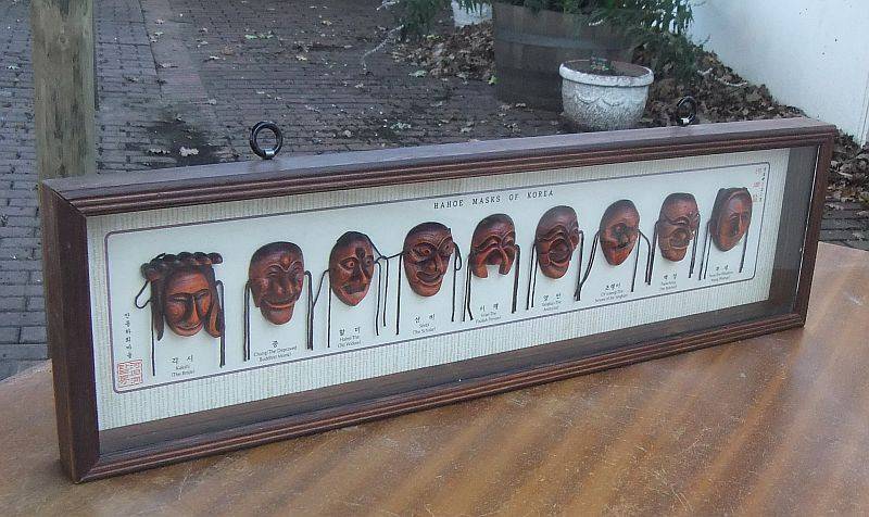 A SUPER COOL VINTAGE BOX FRAME WALL MOUNTING CONTAINING EXAMPLES OF THE HAHOE MASKS OF KOREA  !!
