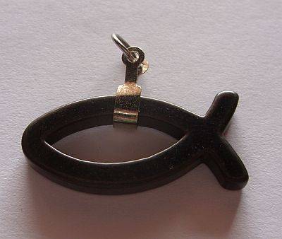 A FISH PENDANT MADE OF STONE