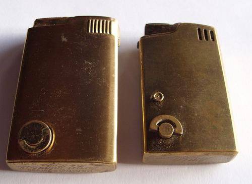 COLLECTABLE - TWO VINTAGE MUSICAL LIGHTERS - PLAY TUNES BUT NEED TLC
