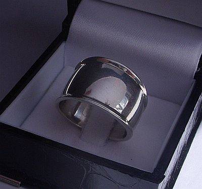 A MARVELOUS WIDE AND TOUGH SOLID STERLING SILVER RING - LOOKS NEW !!!