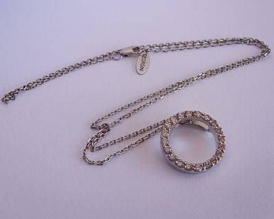 A MAGNIFICENT DESIGNER STERLING SILVER NECKLACE WITH CZ PENDANT BY GEORGINI