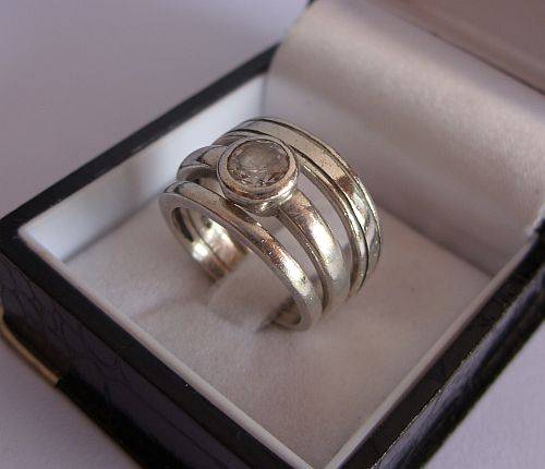 THREE STERLING SILVER RINGS