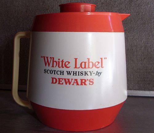 A COOL ICE WATER JUG / BUCKET ADVERTISING WHITE LABEL SCOTCH WHISKY BY DEWARS