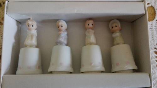 4 Boxed Enesco Precious Moments Four seasons limited edition thimbles.