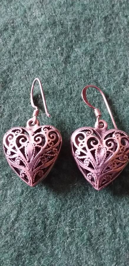 A Pair Of Sterling Silver Heart Shaped Earrings