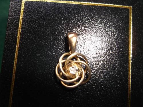 9ct Gold And Diamond Love Knot Pendant