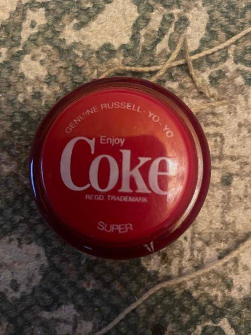 Vintage Coca-Cola Yo-Yo with red rim