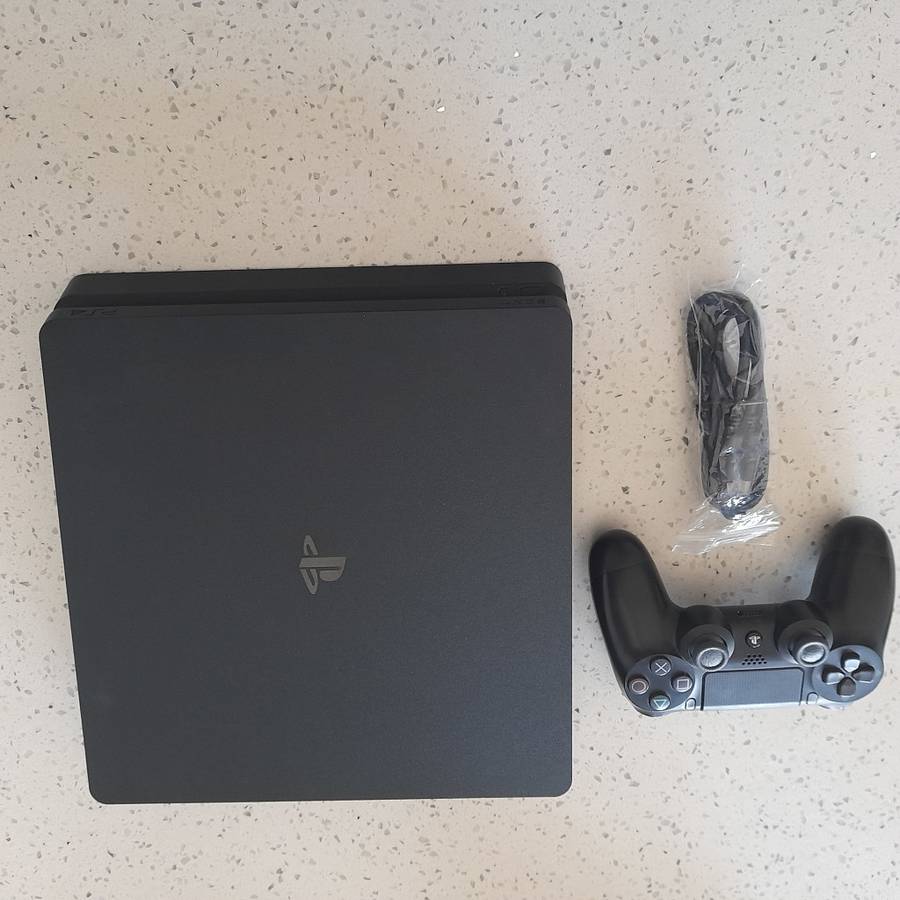 Unbeatable Deal Sony As new Ps 4 Slim with 1 controller and 4 games