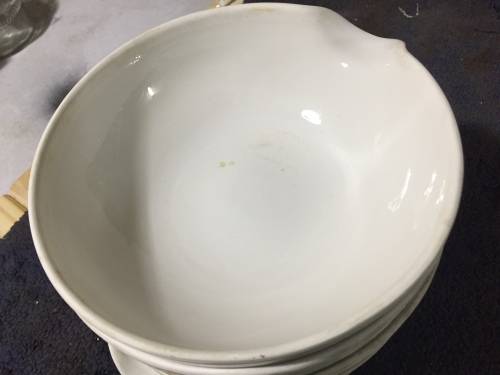 Old ceramic bowls used in a chemistry lab