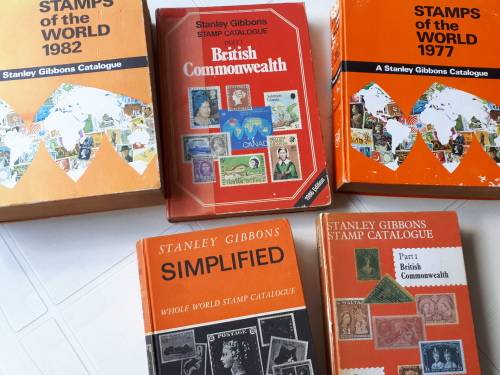 Stanley Gibbons Stamp Catalogue hard cover books × 5