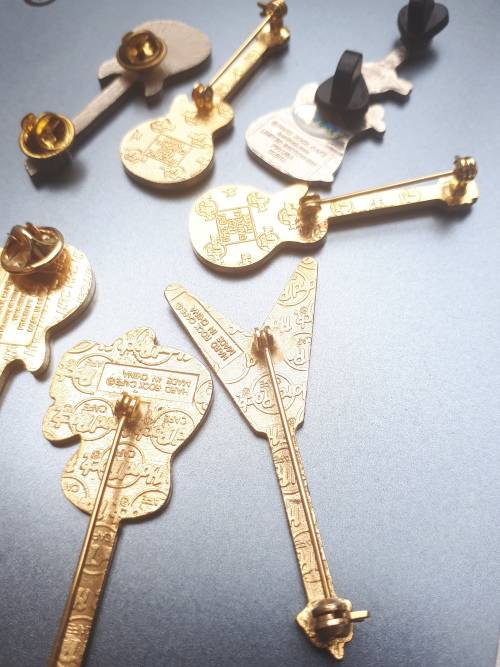 Hard Rock Cafe Guitar pins x 6 plus one other rock guitar