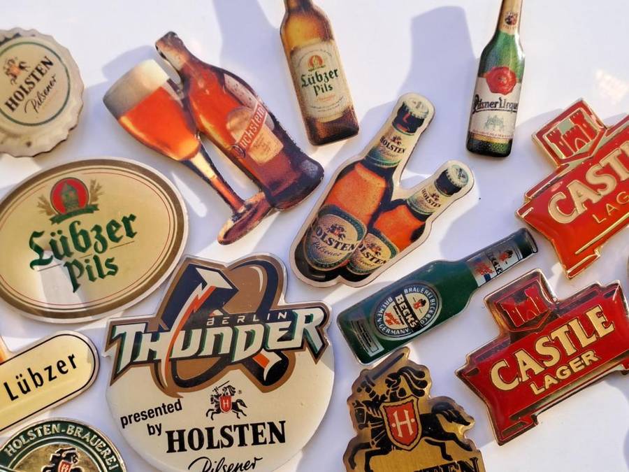 Beer pin badges German and other European beers plus 2 x Castle Lager pin badges