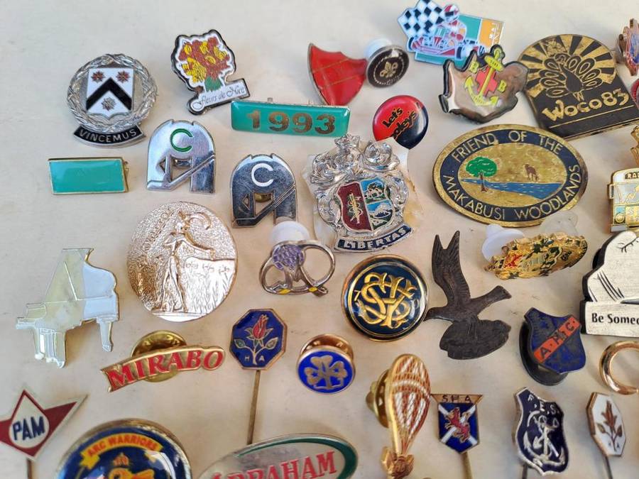 100 pin badges in all sizes and subject matter