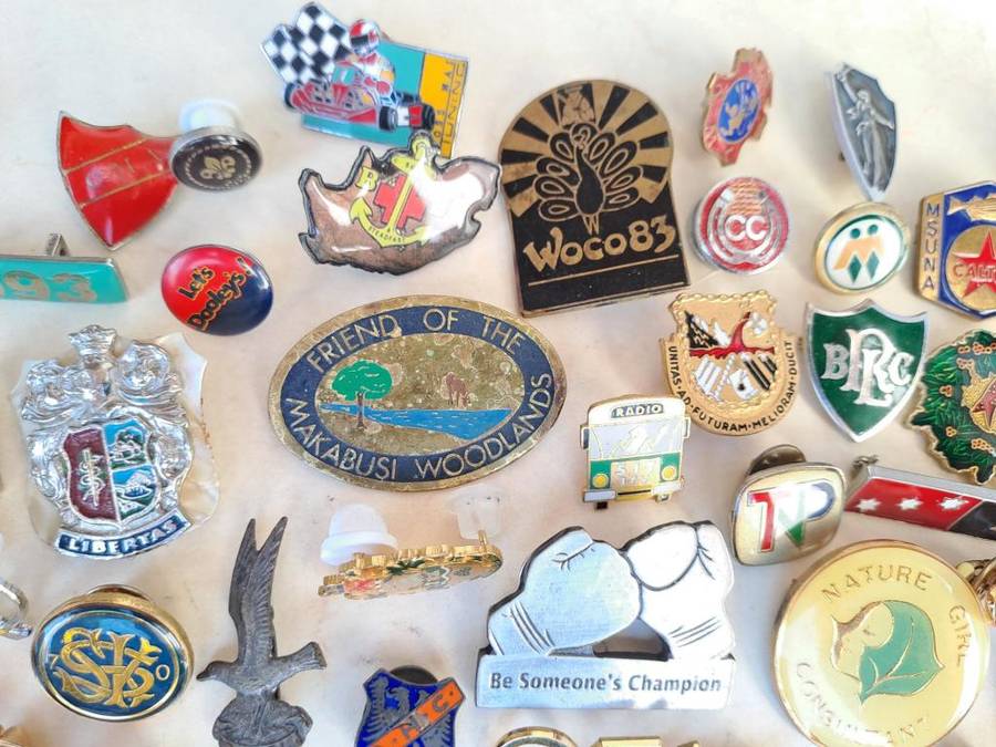 100 pin badges in all sizes and subject matter