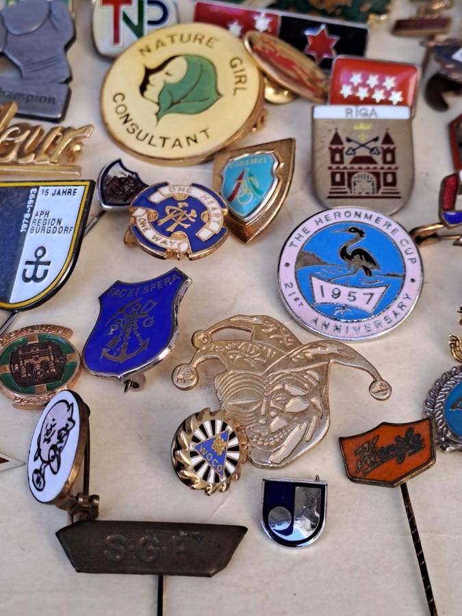 100 pin badges in all sizes and subject matter
