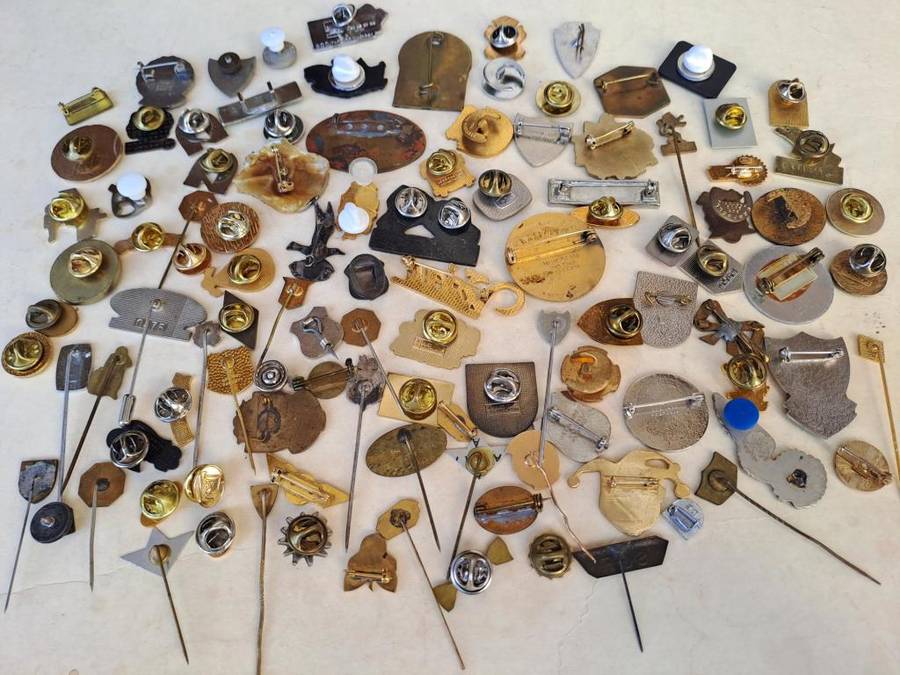 100 pin badges in all sizes and subject matter