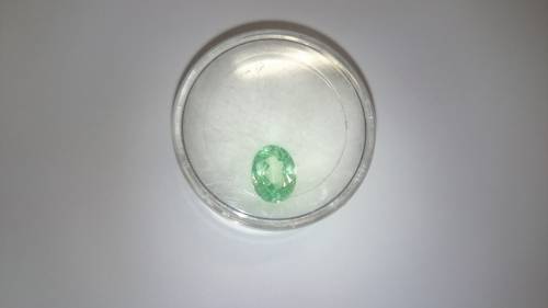 light green oval Synthetic Spinel 7x9mm