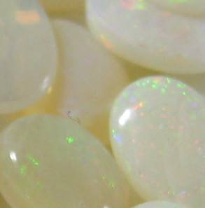 Incredible .60 ctw each Genuine White Opal with Oval Shape and Cabochon cut, 7x5 mm each