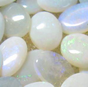 Incredible .60 ctw each Genuine AUSTRALIAN OPAL with Oval Shape and Cabochon cut, 7x5 mm each