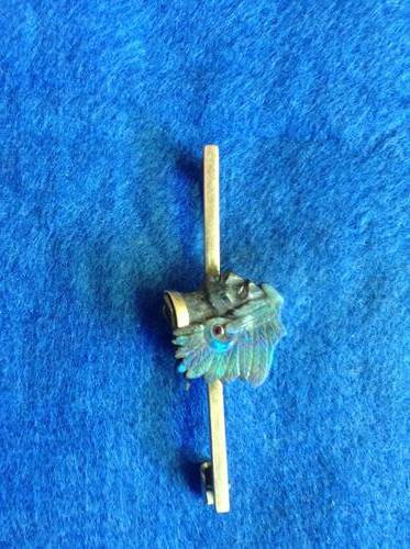 GOLD PIN WITH AMERICAN INDIAN IN BLACK OPAL