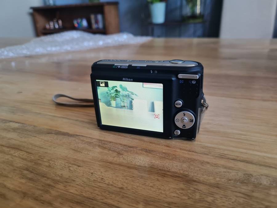 Nikon Coolpix pocket camera + 32GB of SD Cards