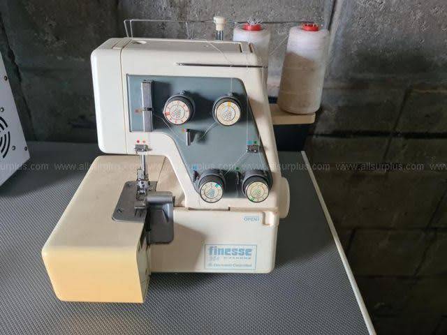 2 Sewing Machines plus free comforter
