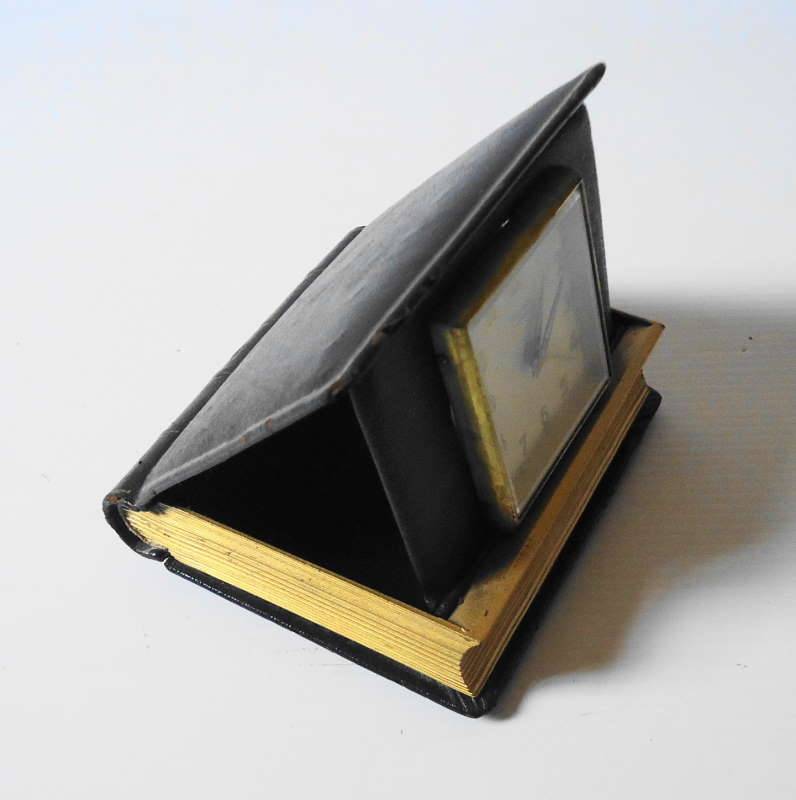 VINTAGE HELVECO LIVRE D'HEURES ALARM CLOCK IN BLUE BOOK LIKE CASE: SWISS MADE