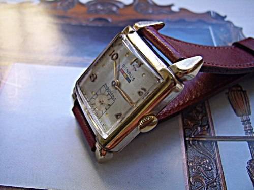 VINTAGE 1940'S BENRUS - ENDURABLE - WITH RED, YELLOW, BLUE LOGO