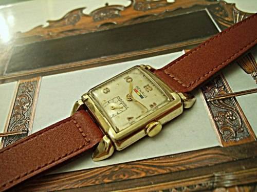 VINTAGE 1940'S BENRUS - ENDURABLE - WITH RED, YELLOW, BLUE LOGO