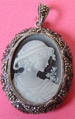 Sterling Silver, Marcasite and Cameo Pendant.