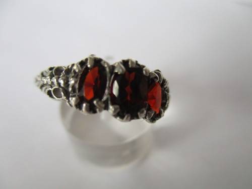 925 Sterling Silver  and genuine Garnets Ring