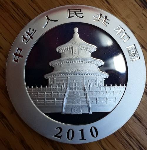 CHINA - 2010 UNC 10 YUAN SILVER PANDA, ONE OUNCE 0,999 SILVER. IN CAPSULE.