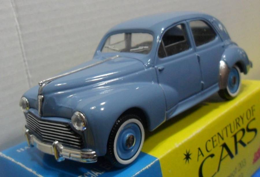 SOLIDO 1953 PEUGEOT 203 - " A CENTURY OF CARS SERIES "  MINT BOXED                               .