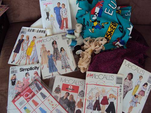 BOX OF SEWING ITEMS, patterns, cottons, stretch lace etc