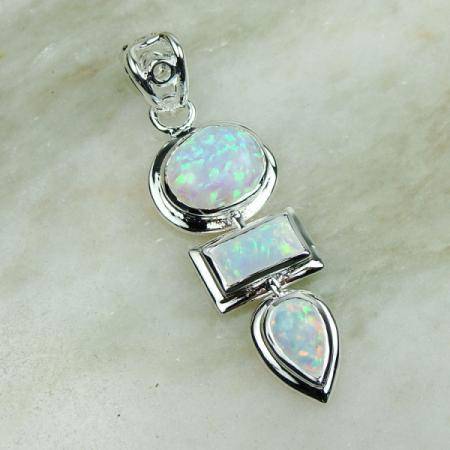 MARYKAY - GORGEOUS WHITE FIRE OPAL PENDANT SET IN STERLING SILVER