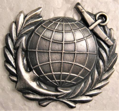 OLD S.A. NAVY MARINES BREAST BADGE WITH PINS AND CAPS IN AN UNUSED CONDITION