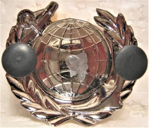 S.A. MARITIME REACTION/MARINES BREAST BADGE WITH PINS AND CAPS IN AN UNUSED CONDITION